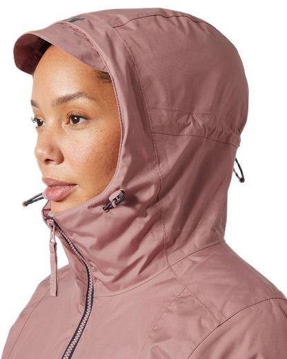 Ash Rose Coloured Helly Hansen Womens Westport Insulated Coat on white background 