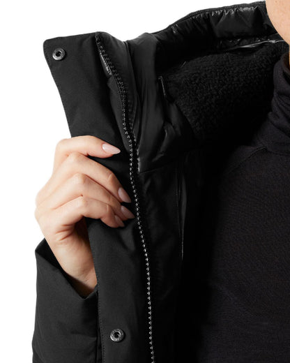 Black Coloured Helly Hansen Womens Winter Bliss Down Jacket on white background 