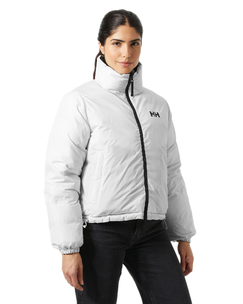 Black Coloured Helly Hansen Womens YU 23 Reversible Puffer Jacket on white background 