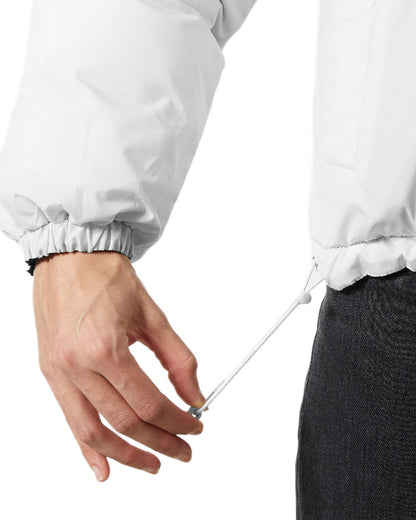 Black Coloured Helly Hansen Womens YU 23 Reversible Puffer Jacket on white background 