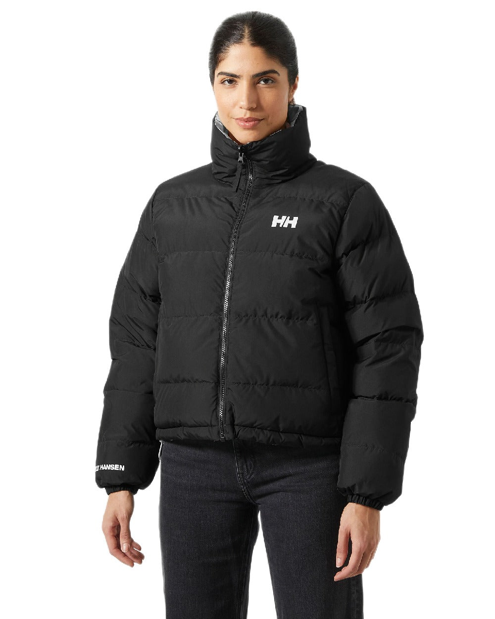 Black Coloured Helly Hansen Womens YU 23 Reversible Puffer Jacket on white background 