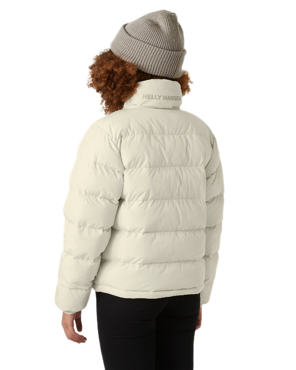 Cream Coloured Helly Hansen Womens YU 23 Reversible Puffer Jacket on white background 