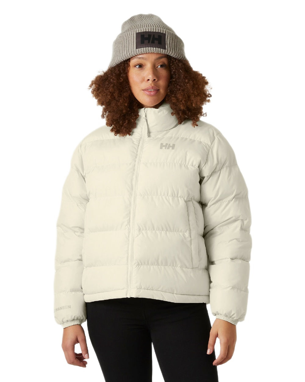 Cream Coloured Helly Hansen Womens YU 23 Reversible Puffer Jacket on white background 