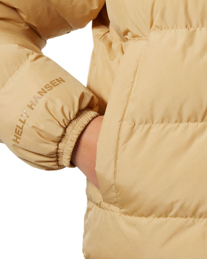 Sandstorm Coloured Helly Hansen Womens YU 23 Reversible Puffer Jacket on white background 