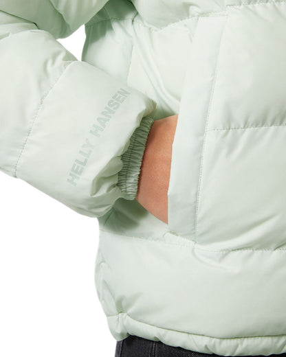 Seafoam Coloured Helly Hansen Womens YU 23 Reversible Puffer Jacket on white background 