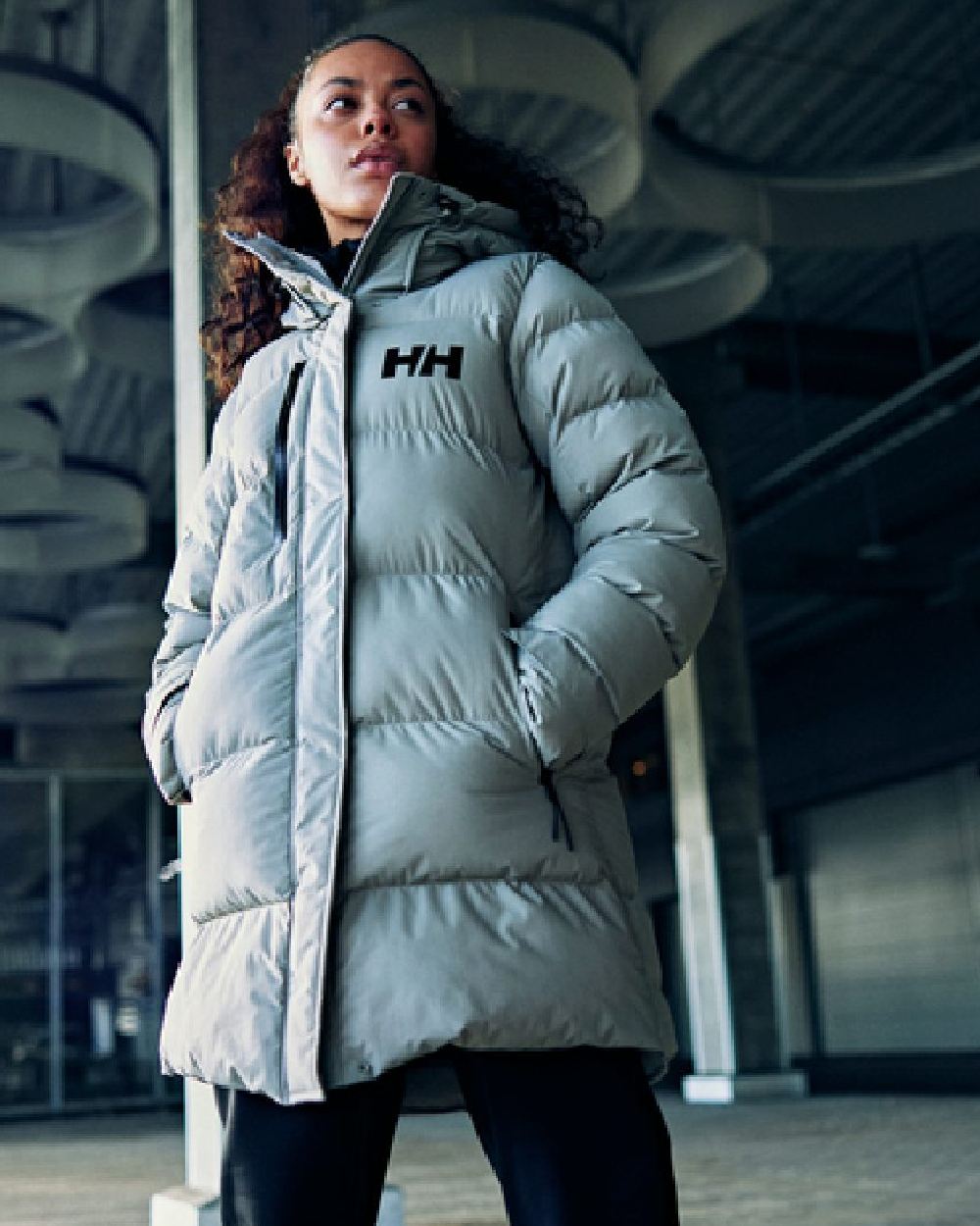 Baby Trooper Helly Hansen Adore Ladies Puffy Parka on wall background 