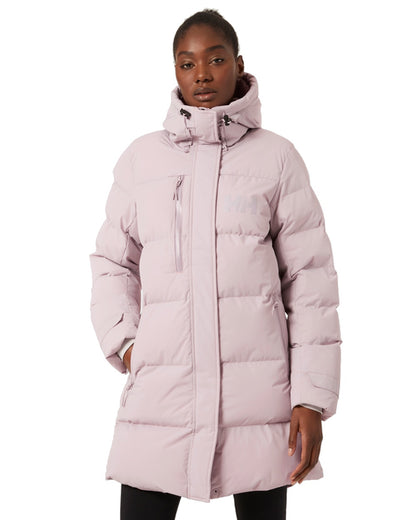 Dusty Syrin Helly Hansen Adore Ladies Puffy Parka on white background 