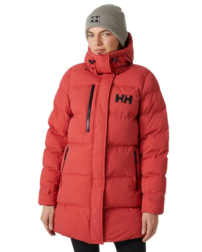 Poppy Red Helly Hansen Adore Ladies Puffy Parka on white background 