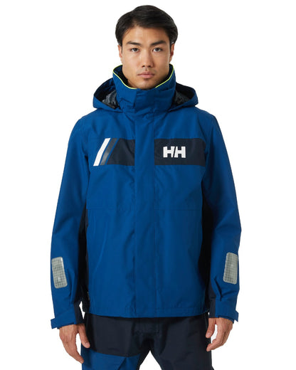 Deep Fjord coloured Helly Hansen Mens Newport Inshore Sailing Jacket on white background 