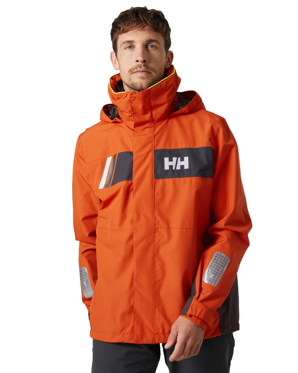 Patrol Orange coloured Helly Hansen Mens Newport Inshore Sailing Jacket on white background 