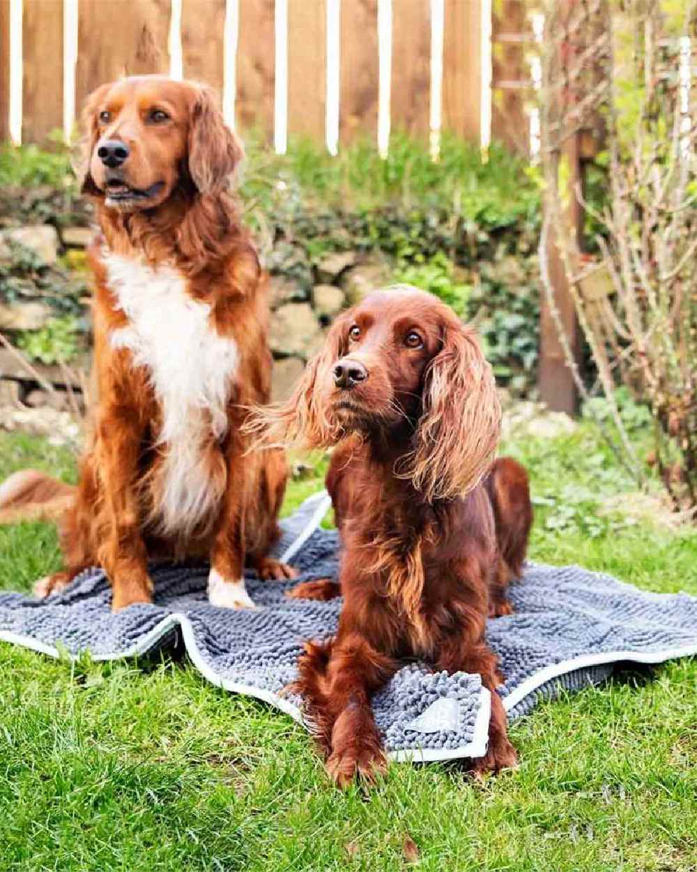 Grey Blue coloured Henry Wag Microfibre Noodle Pet Mat on garden background 