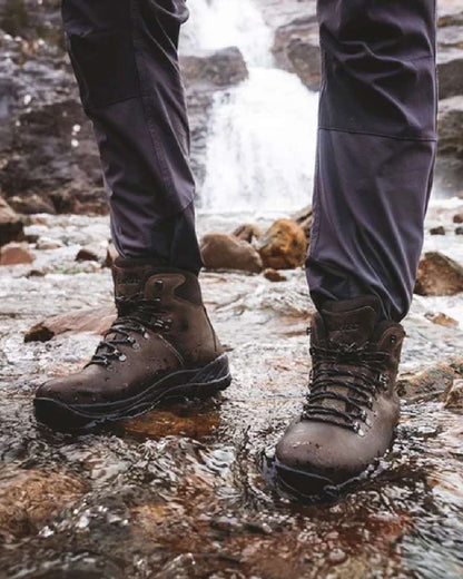 Brown coloured Hi-Tec Ravine Waterproof Hiking Boots on river background