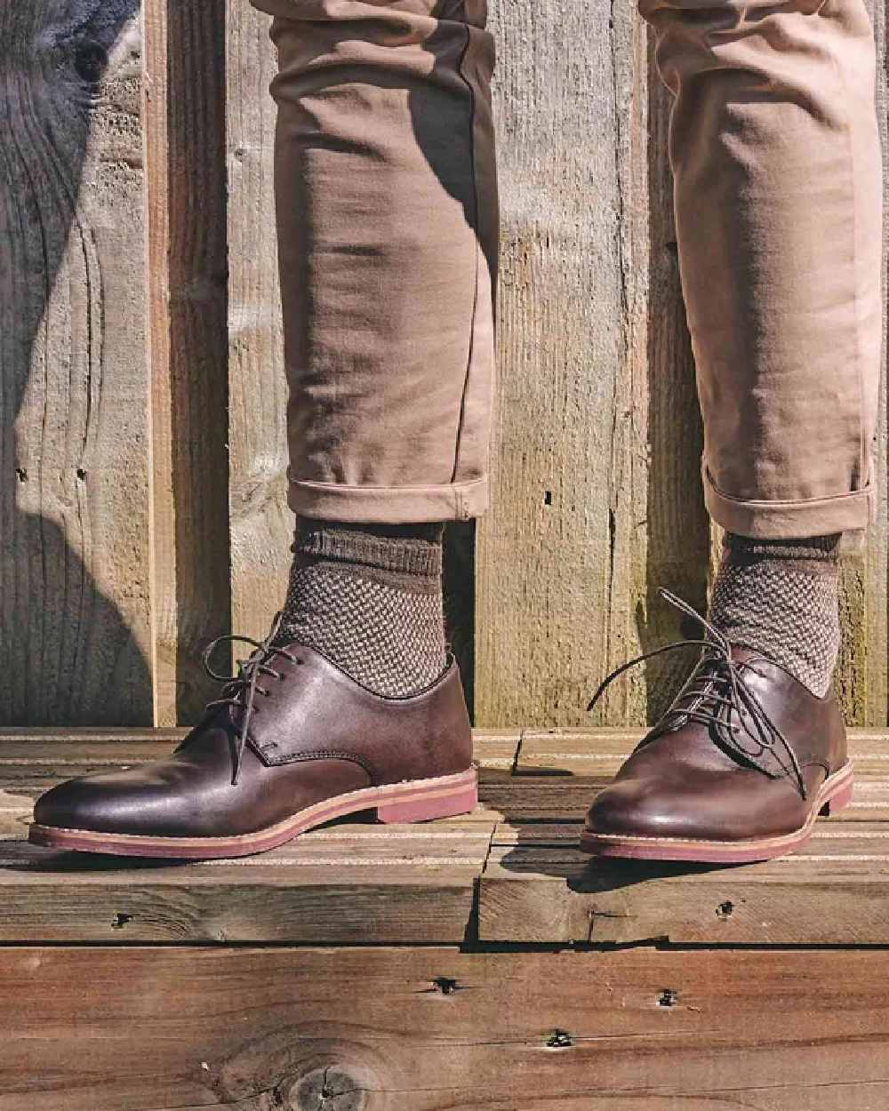 Oatmeal coloured Hj Hall Jacquard Wool Softop Socks on outdoor background 