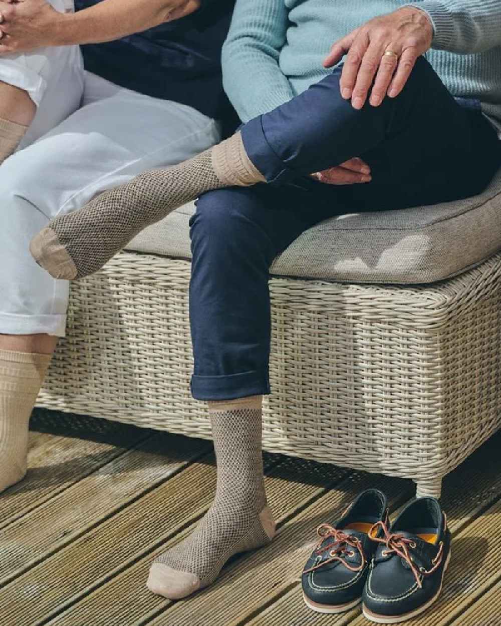 Oatmeal coloured Hj Hall Jacquard Wool Softop Socks on indoor background 