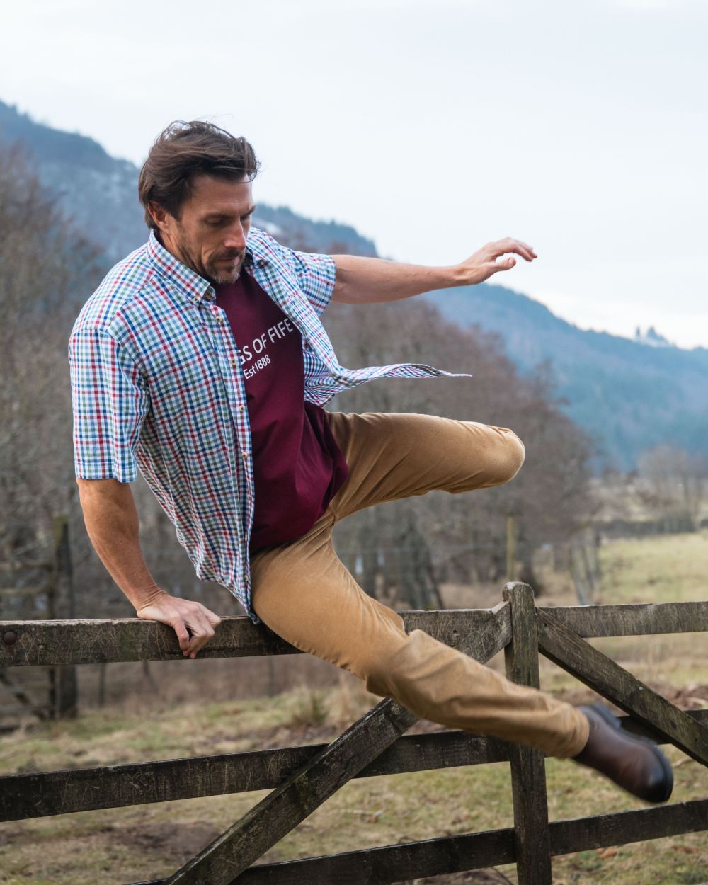Green Red Coloured Hoggs of Fife Aberdour Short Sleeve Shirt on mountain background 