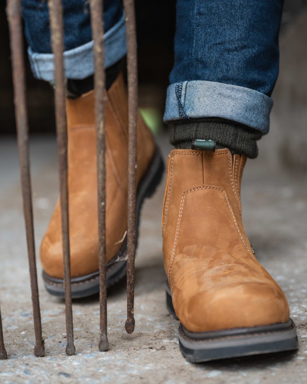 Waxy-Tan Coloured Hoggs of Fife Air-Shire Dealer Boots on Street background 