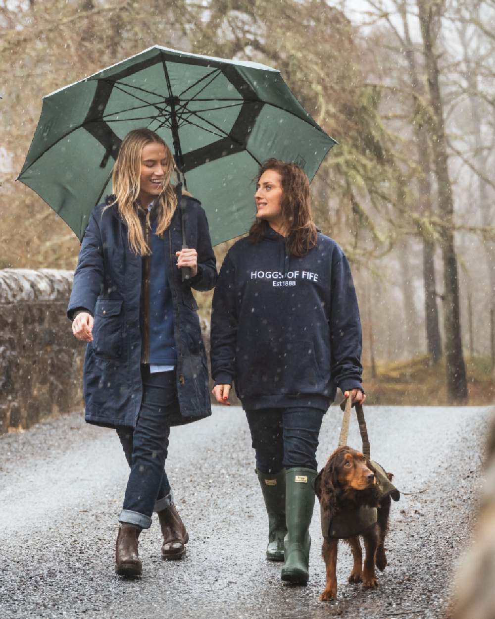 Navy Coloured Hoggs of Fife Annan 1888 Hoodie on countryside background 