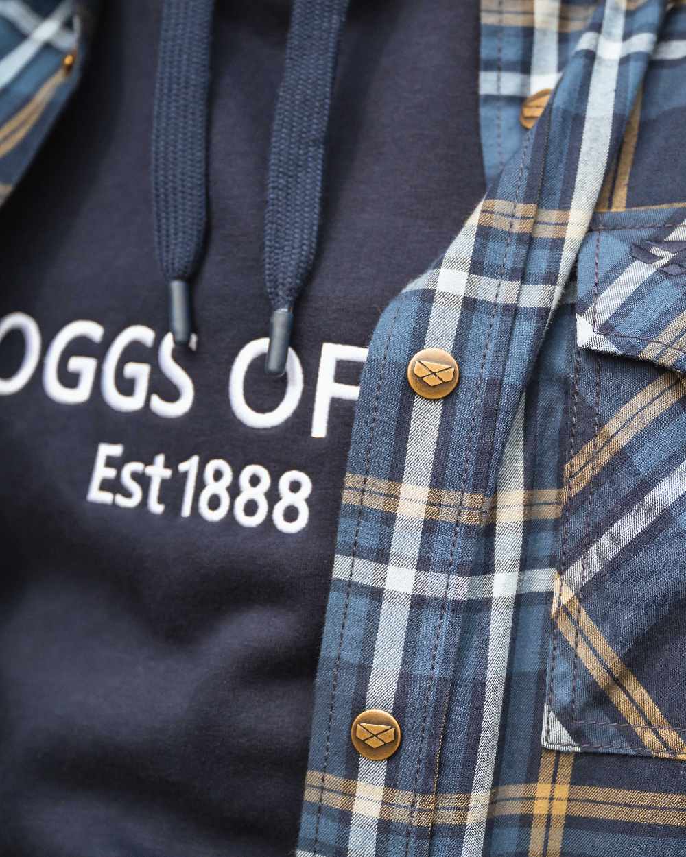 Navy Coloured Hoggs of Fife Annan 1888 Hoodie on countryside background 