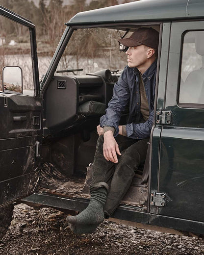 Dark Wash Coloured Hoggs of Fife Archerfield Denim Shirt on car background 