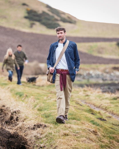 Dark Wash Coloured Hoggs of Fife Archerfield Denim Shirt on mountain background 