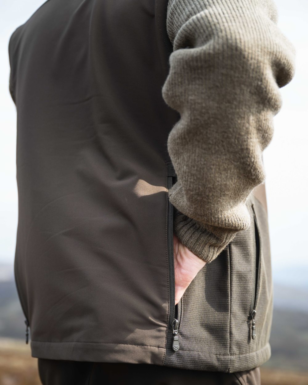 Green Coloured Hoggs of Fife Ardross 4-Way Active Gilet on outdoor background 
