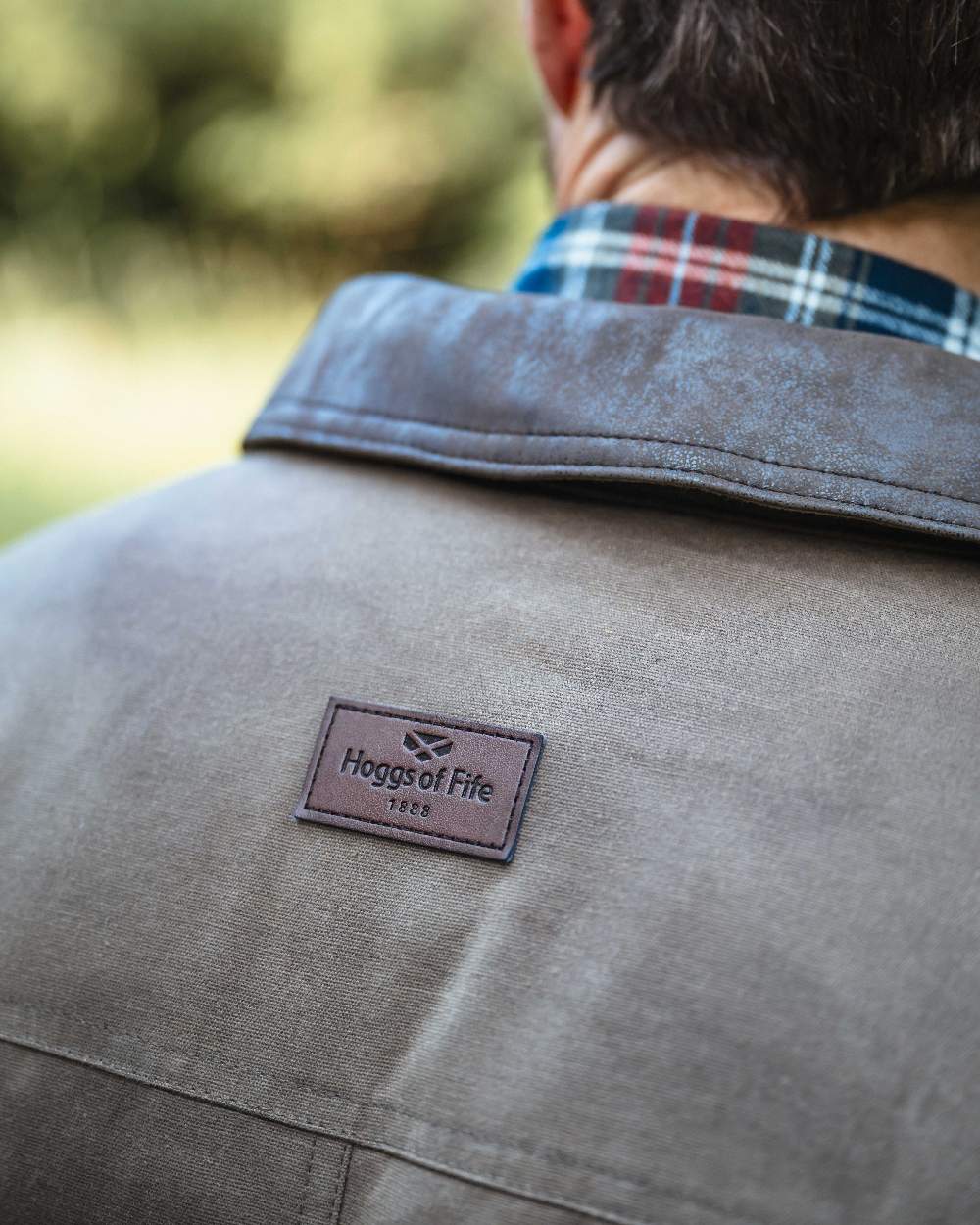 Rock Coloured Hoggs of Fife Balerno Waxed Canvas Barn Coat on outdoor background 