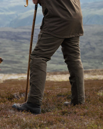 Green Coloured Hoggs of Fife Ballater Waterproof Field Trousers on sky background 