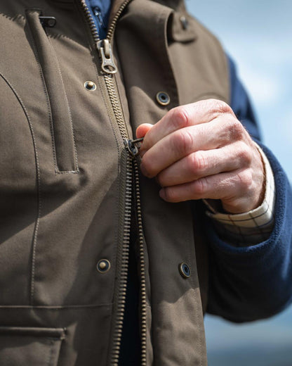 Green Coloured Hoggs of Fife Ballater Waterproof Field Waistcoat on outdoor background 