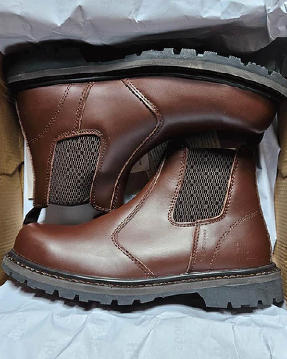 Brown Coloured Hoggs of Fife Brown Zeus Safety Dealer Boots on box background 