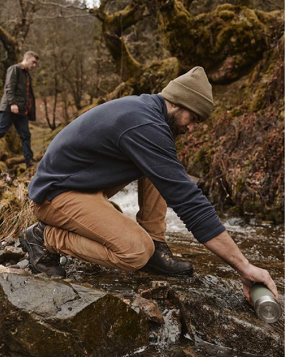 Harvest Coloured Hoggs of Fife Cairnie Comfort Stretch Cord Trousers on mountain background 