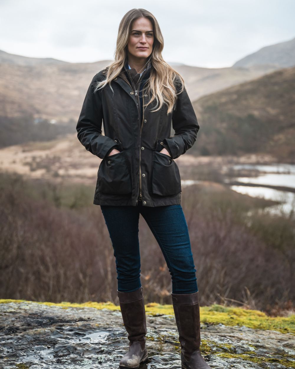 Antique Olive Coloured Hoggs of Fife Caledonia Ladies Antique Wax Jacket on mountain background 