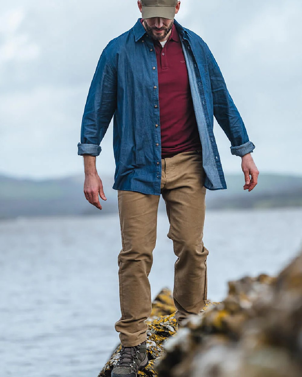 Dried Moss Coloured Hoggs of Fife Carrick Technical Stretch Moleskin Jeans on sky background 