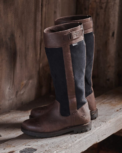 Dark Brown Navy Coloured Hoggs of Fife Cleveland II Womens Country Boots on wooden wall background 