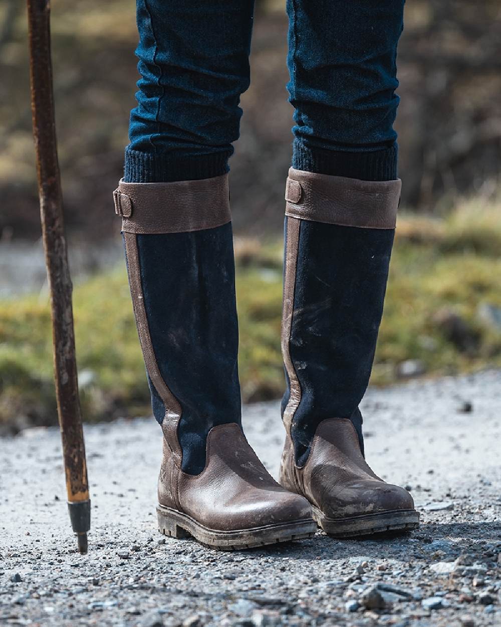 Dark Brown Navy Coloured Hoggs of Fife Cleveland II Womens Country Boots on land background 