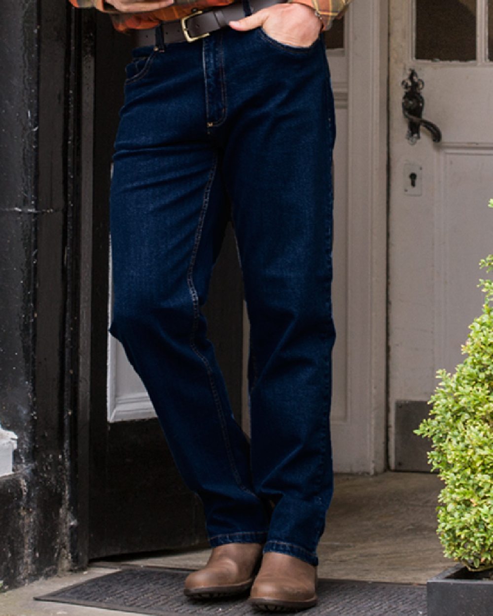 Dark Indigo Coloured Hoggs of Fife Clyde Comfort Denim Jeans on door background 