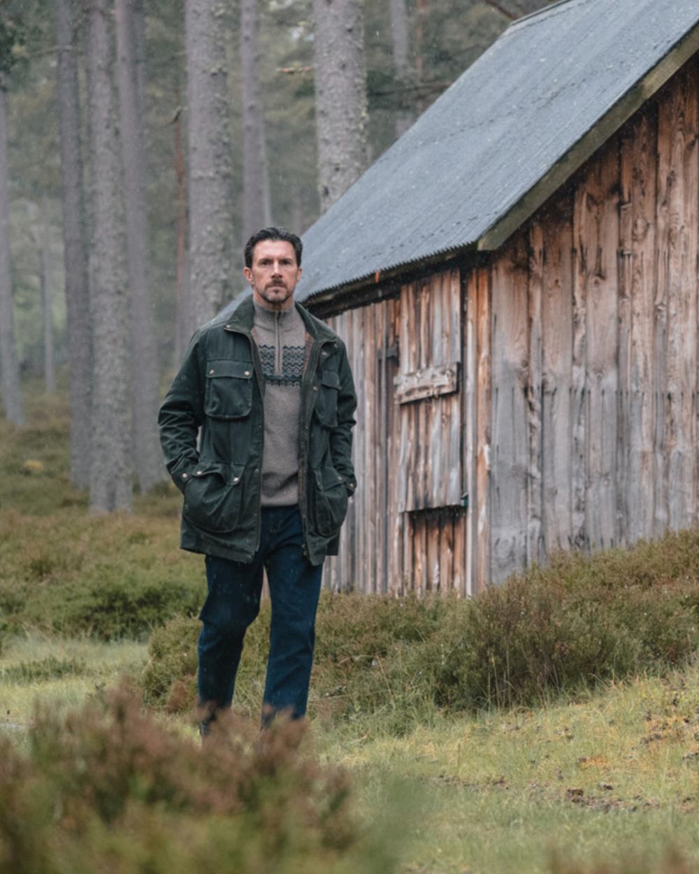 Oatmeal coloured Hoggs of Fife Mens Colonsay Fair Isle Quarter Zip Pullover on forest background 