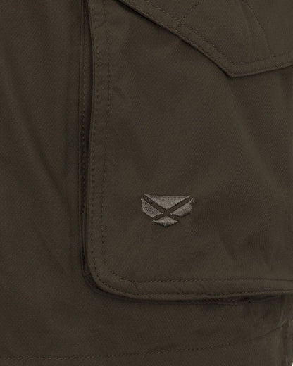 Fern Green coloured Hoggs of Fife Culloden Waterproof Field Jacket on field background 