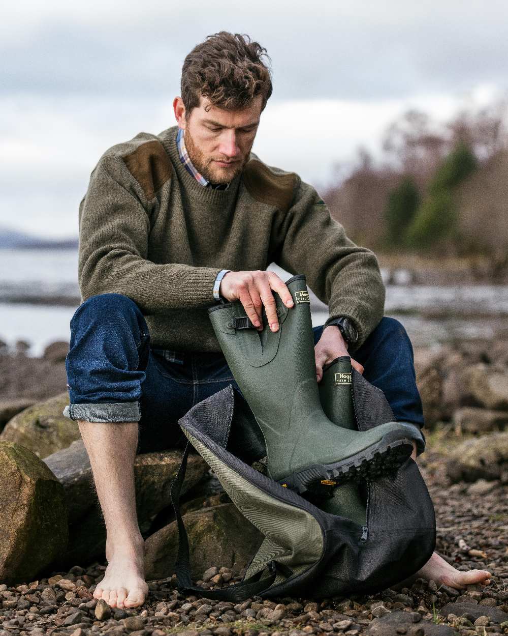 Field Green Coloured Hoggs of Fife Field Sport Neoprene Lined Wellingtons on coastal background 