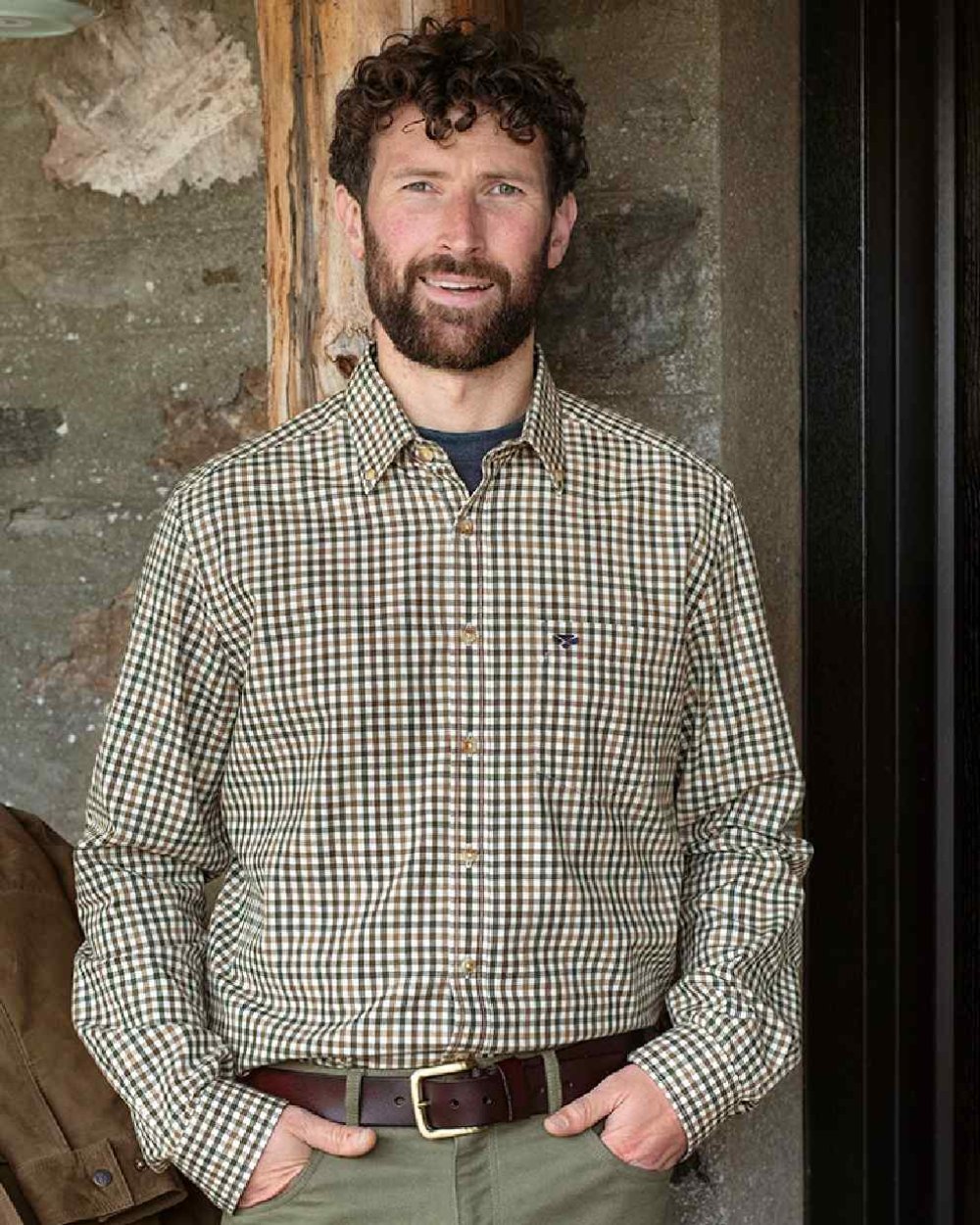 Brown Green Coloured Hoggs of Fife Garvock Cotton Twill Herringbone Check Shirt on wall background 