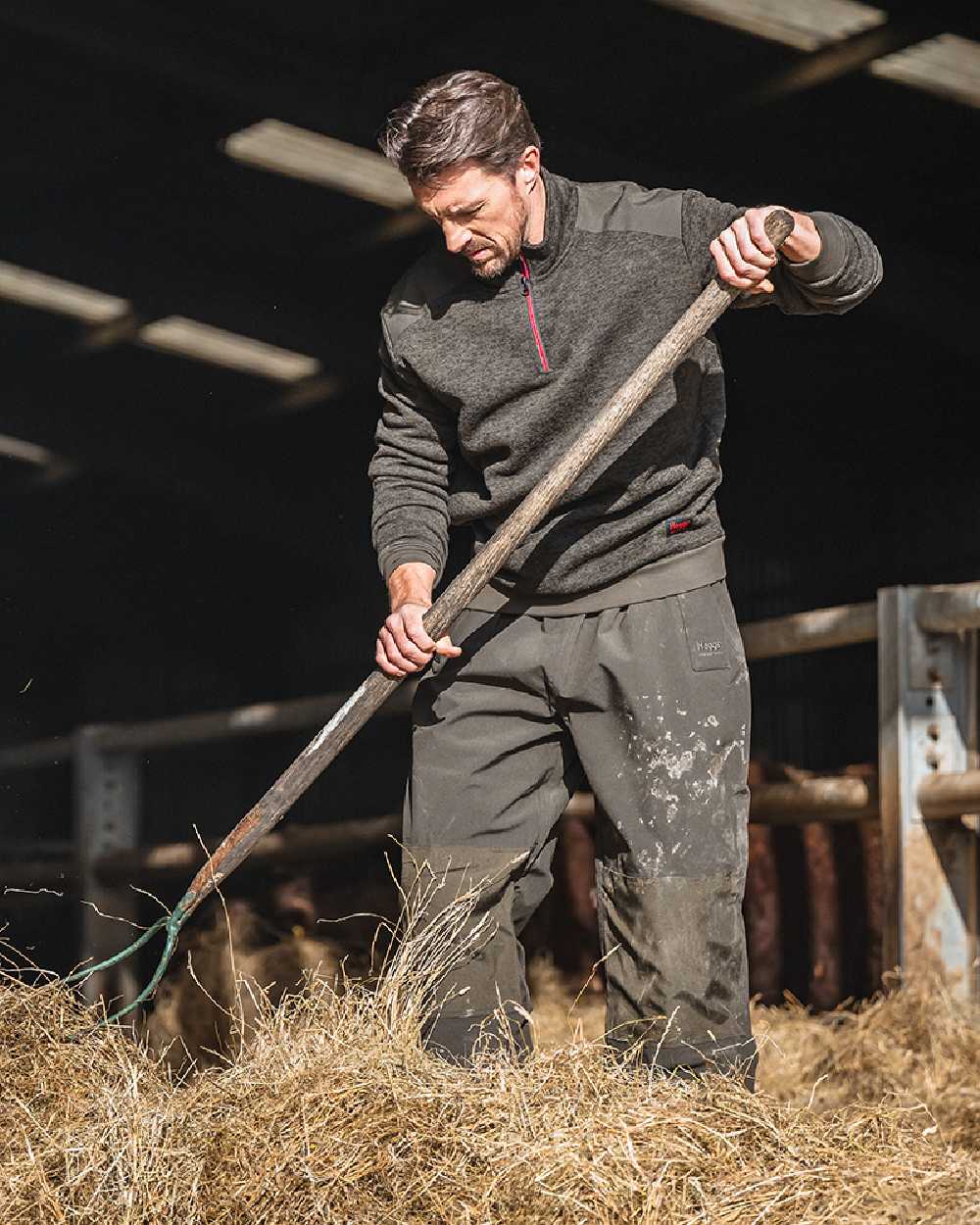 Green Coloured Hoggs of Fife Green King II Quarter Zip Knit Fleece on barn background 