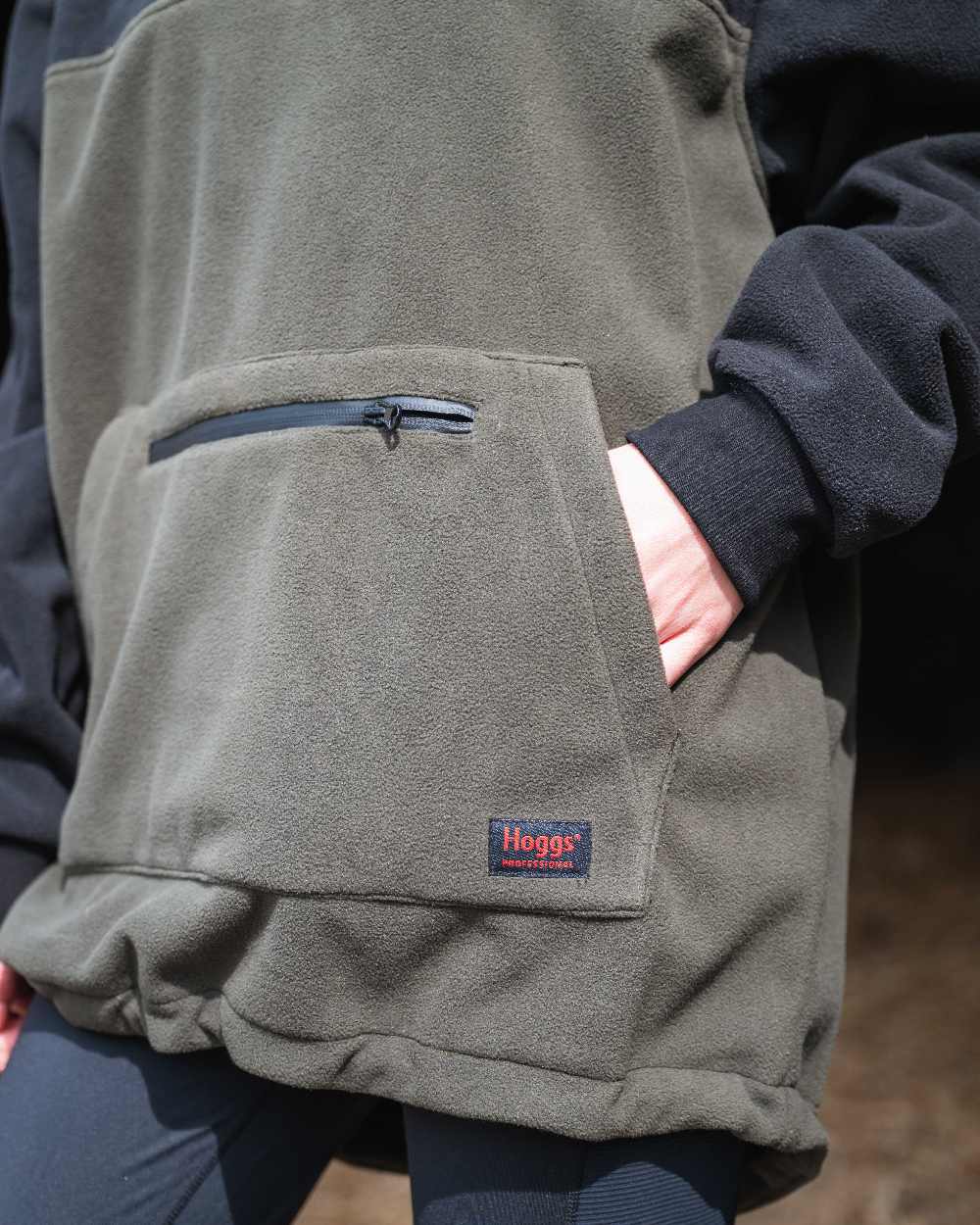 Green Coloured Hoggs of Fife Green King II Stormproof Bonded Hoodie on outdoor background 