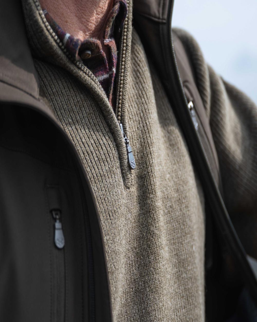 Meadow Green Coloured Hoggs of Fife Hebrides II Quarter Zip Windproof Pullover on mountain background 