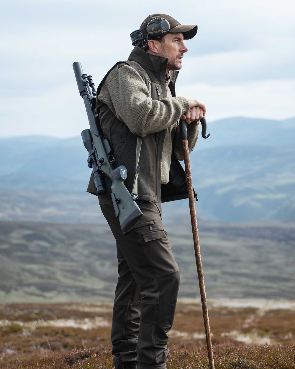 Meadow Green Coloured Hoggs of Fife Hebrides II Quarter Zip Windproof Pullover on mountain background 