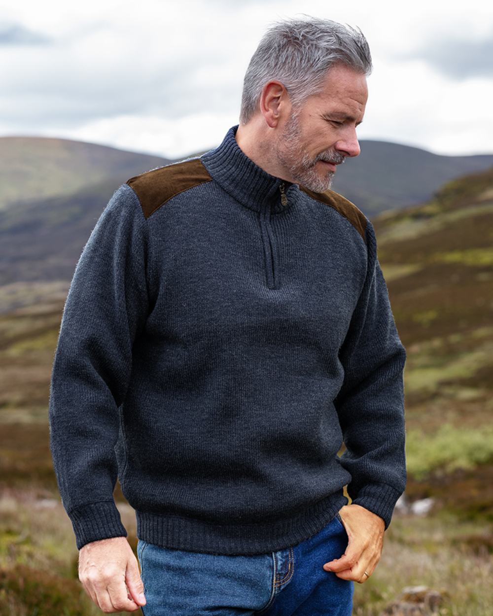 Storm Blue Coloured Hoggs of Fife Hebrides II Quarter Zip Windproof Pullover on mountain background 