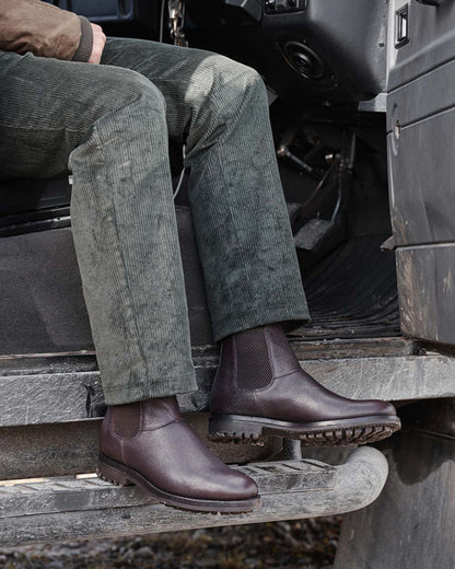 Dark Brown Coloured Hoggs of Fife Helmsdale Full Grain Dealer Boots on car background 