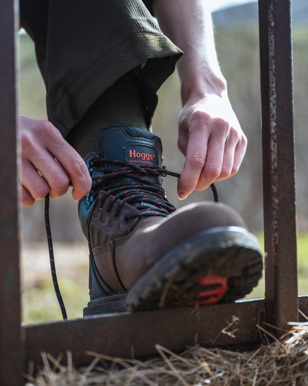 Crazy Horse Brown Coloured Hoggs of Fife Hercules Waterproof Safety Boots on blurry background 