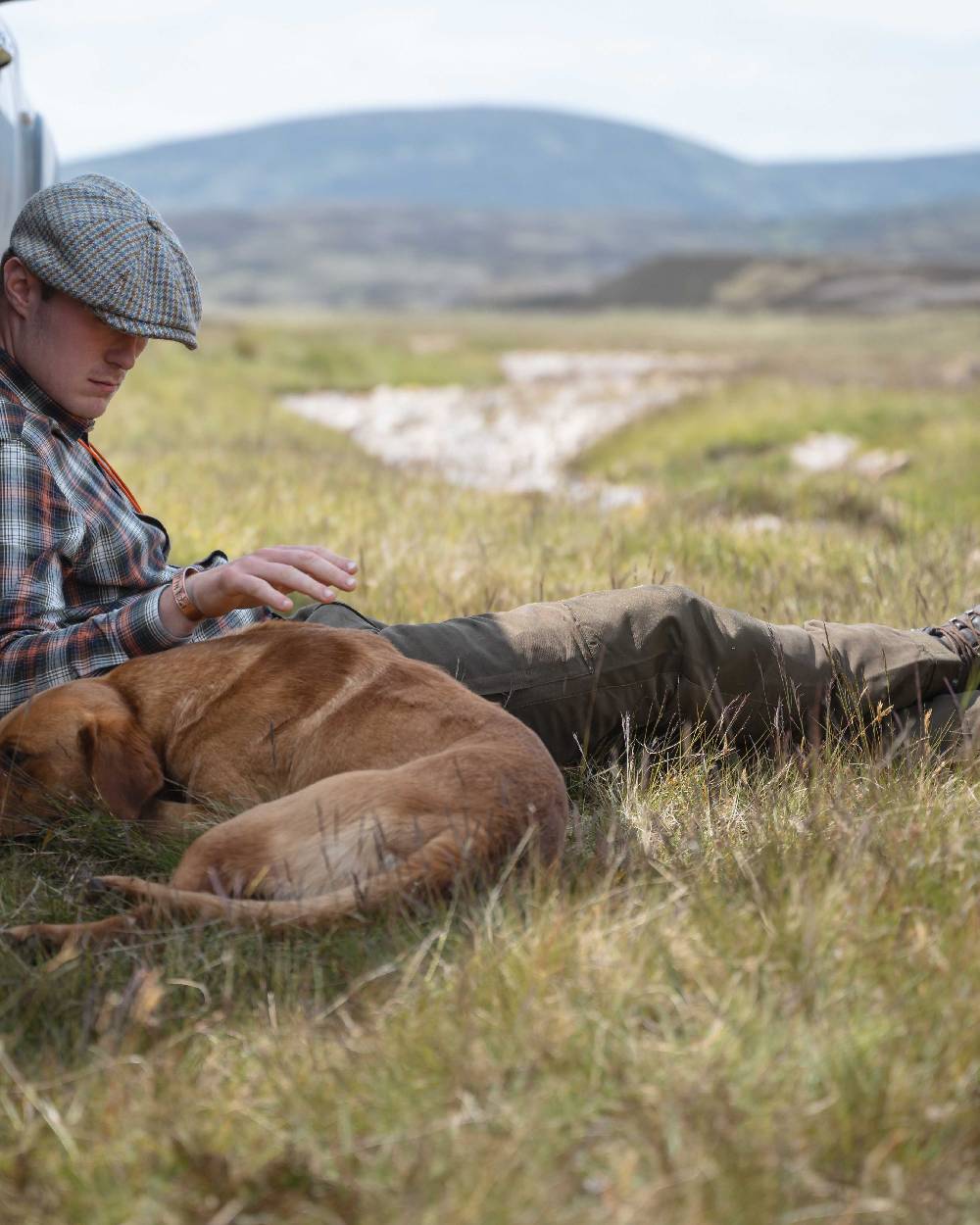 Olive Green Coloured Hoggs of Fife Kincraig Waterproof Field Trousers on outdoor background 