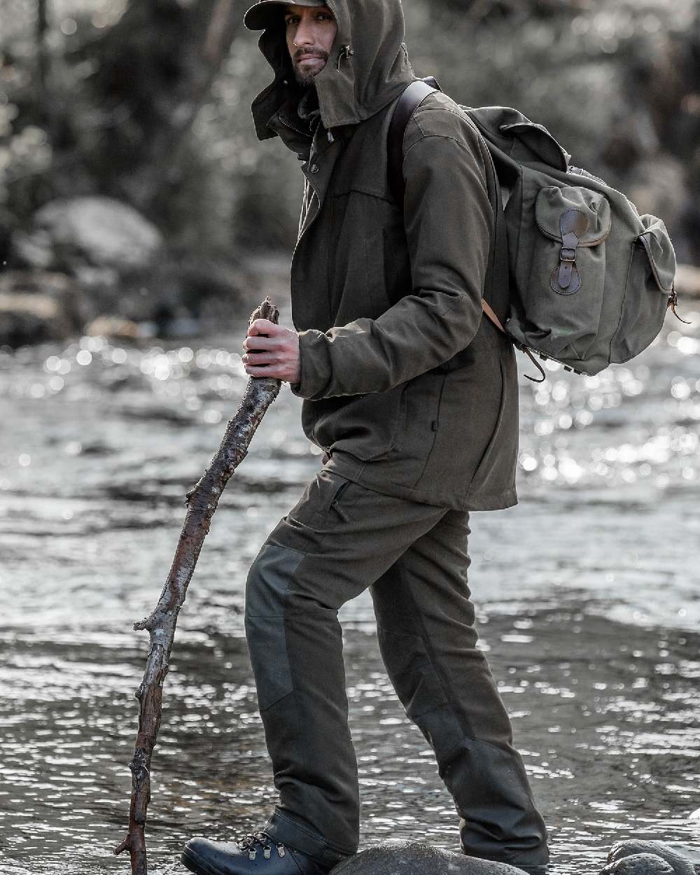 Olive Green Coloured Hoggs of Fife Kincraig Waterproof Field Trousers on river background 