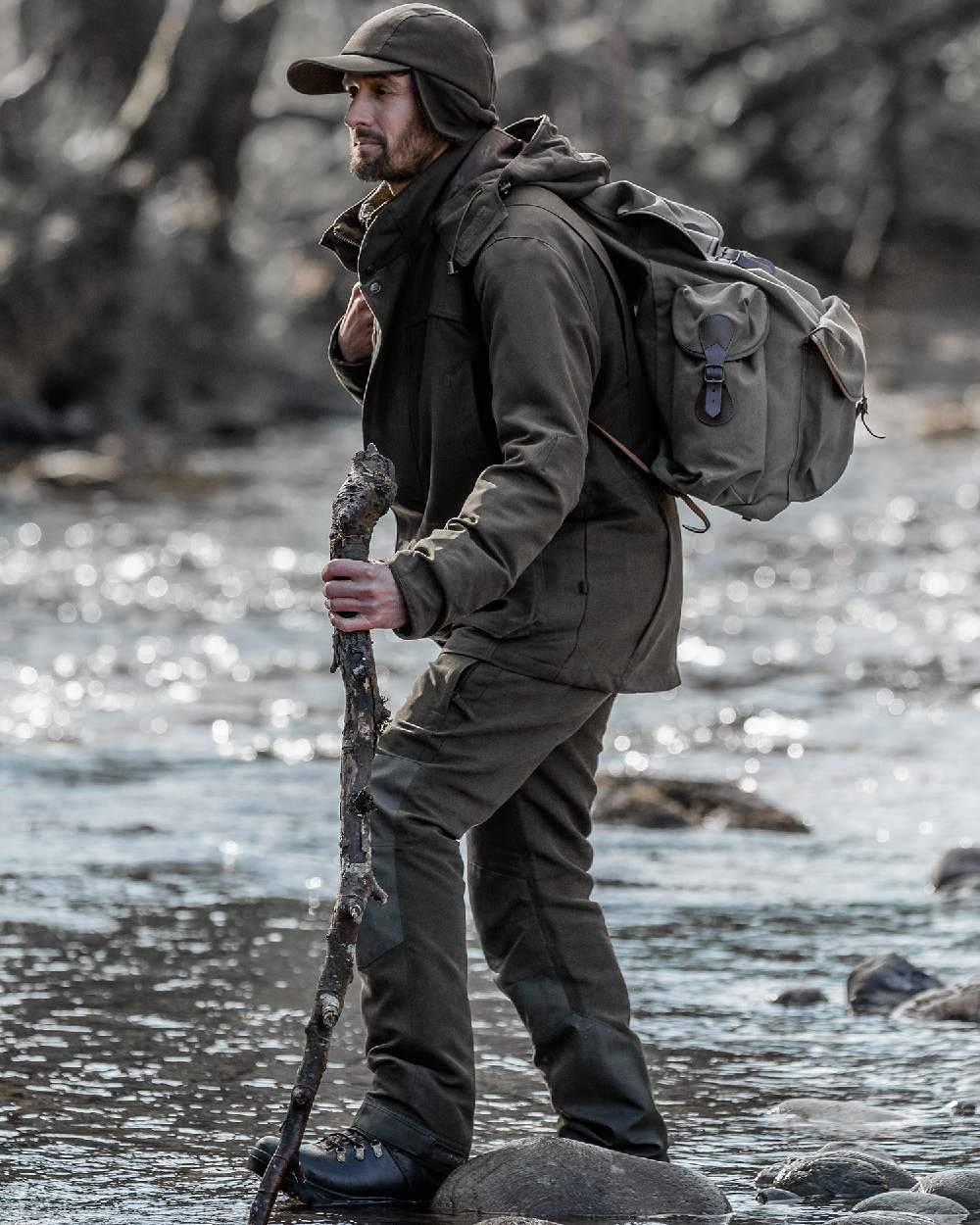 Olive Green Coloured Hoggs of Fife Kincraig Waterproof Field Trousers on river background 