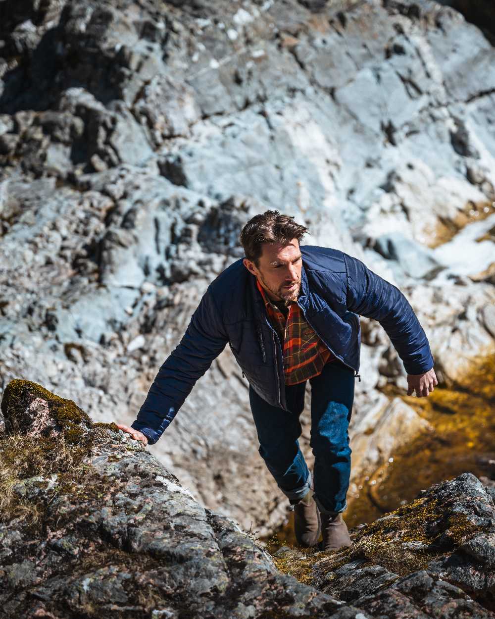 Navy Merlot Coloured Hoggs of Fife Kingston Lightweight Quilted Jacket on mountain background 